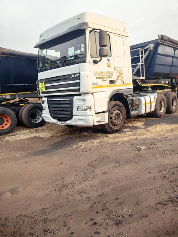 Vurheni Business Group DAF XF horse coupled to a side-tipper trailer at a coal loading site