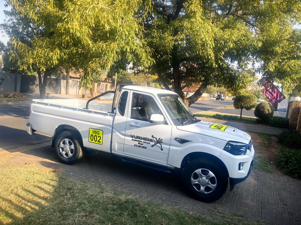 Vurheni Business Group branded white Mahindra support bakkie, fleet number VBG 002, Vacopi Logistics maintenance team vehicle